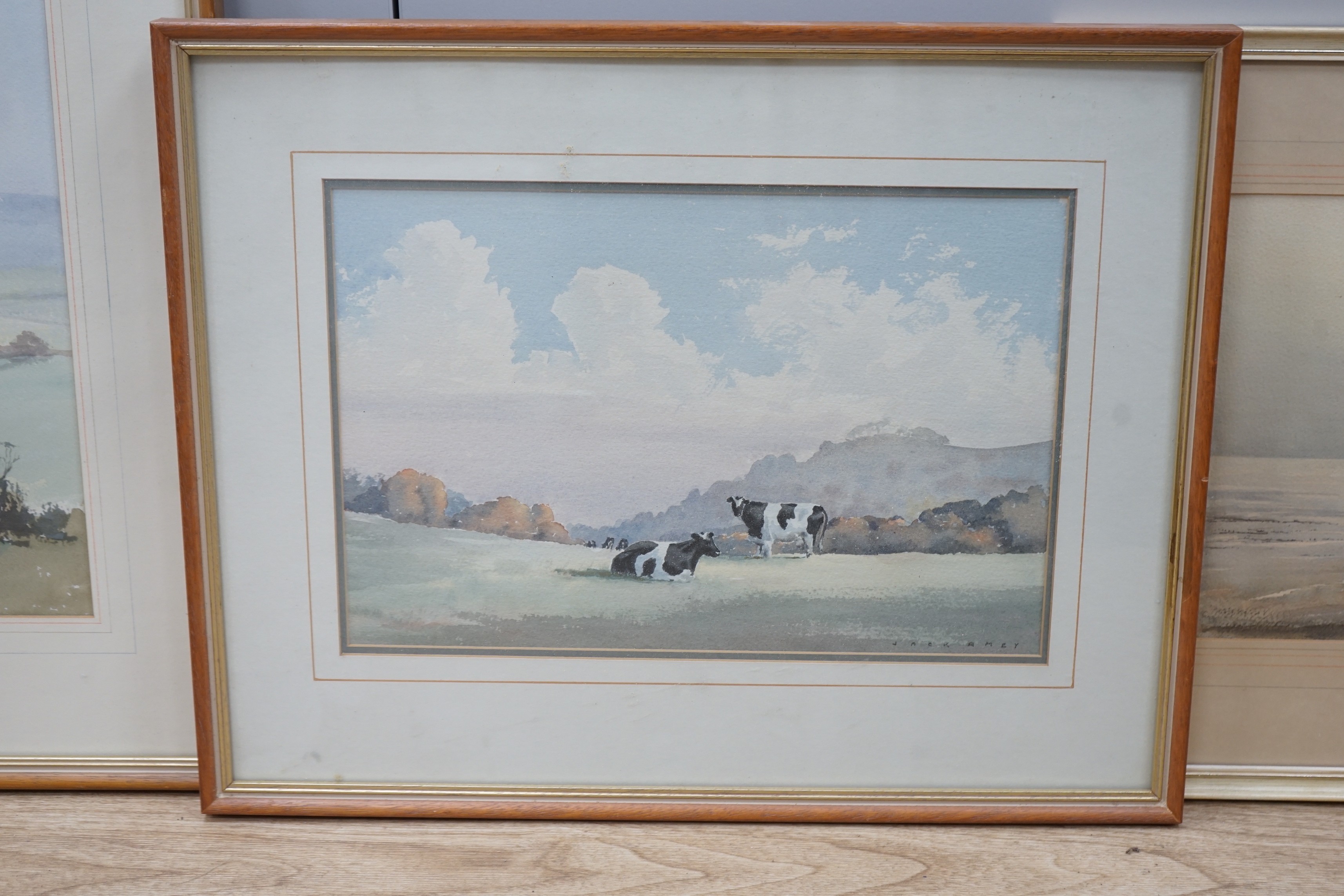 Jack Amey (20th C.), three watercolours, 'Spring at Amberley', 'Cattle at Washington' and 'Beached fishing boats', signed, largest 31 x 47cm